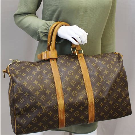 louis vuitton womens duffle bag|louis vuitton duffle bag suitcase.